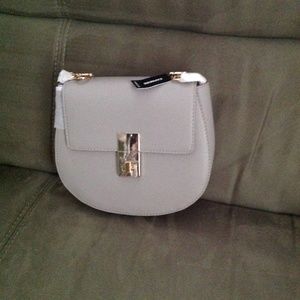 Express cross body grey bag brand new with a tag.